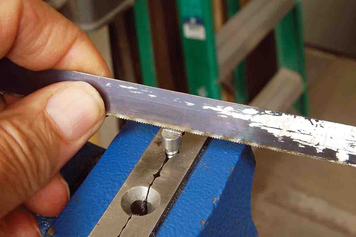 If new screws must be made, a slot of proper width may be cut using a 32-tooth hacksaw blade.